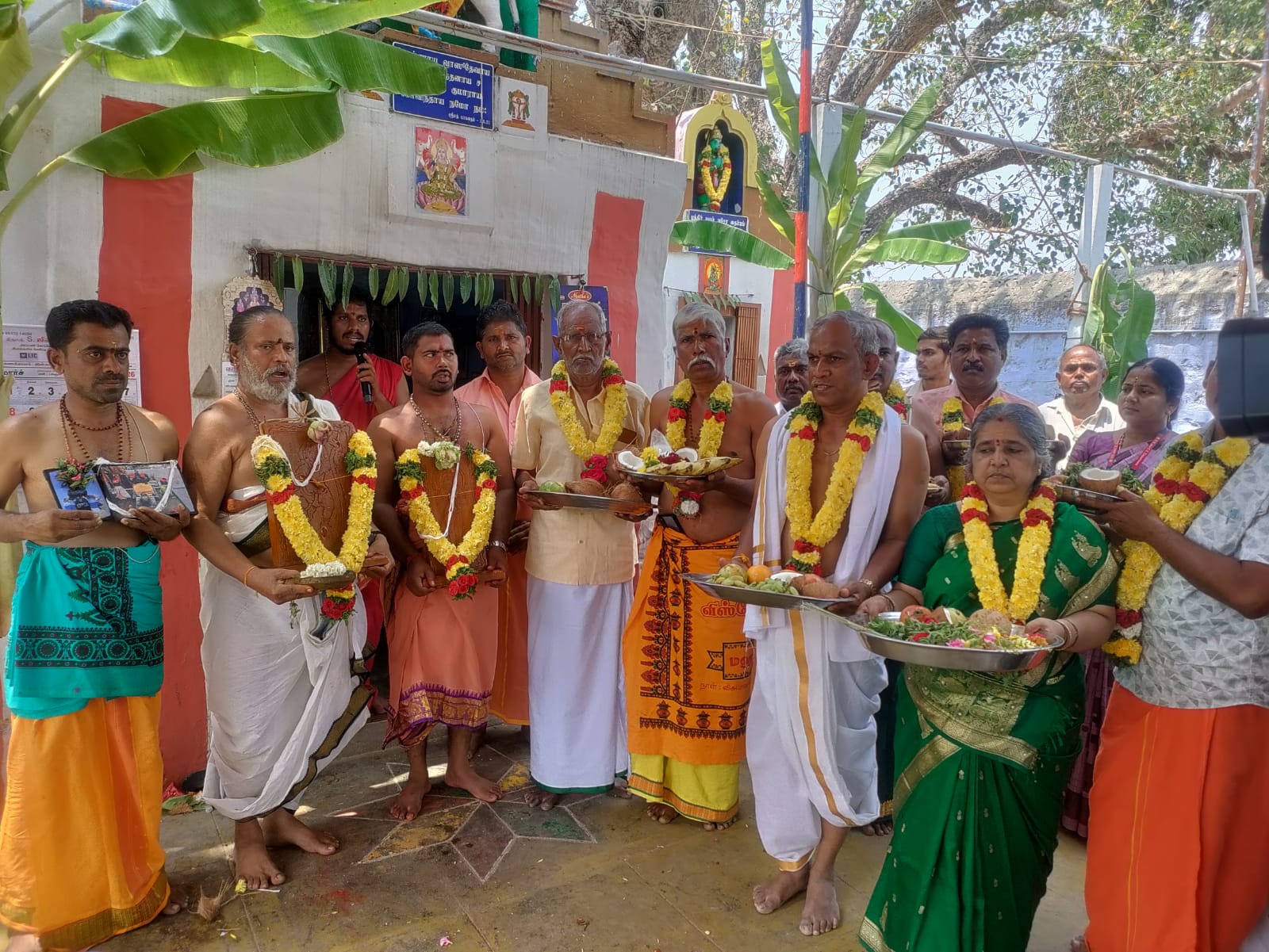 Temple Trustees with Offerings